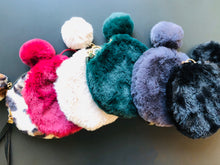 Pochette en fausse fourrure